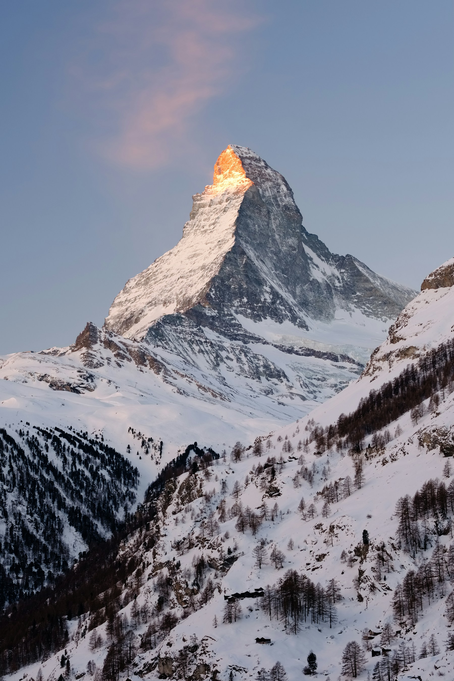 The first golden light touching the snow-covered Matterhorn